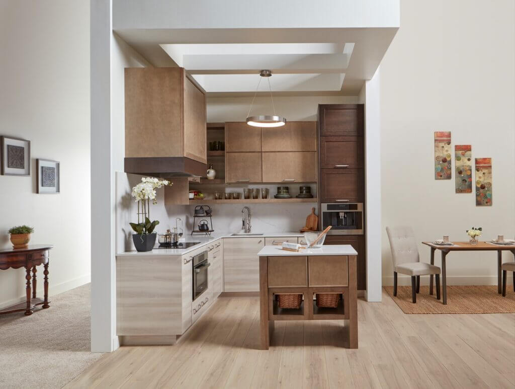 modern kitchen with natural upper cabinets and laminate lower cabinets